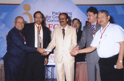 Receiving the 2nd prize from Mr. Anil Kumar Reddy , FCBM, President Quizmaster Ramkumar