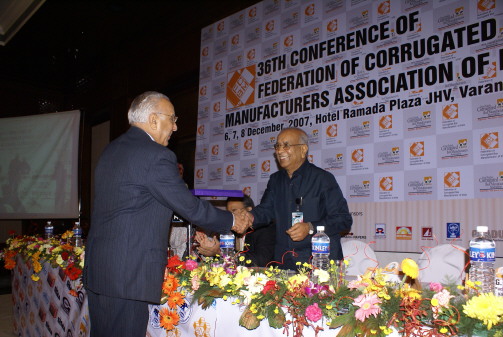 Sri R G Agarwala - receiving memento from Sri M L Mehra